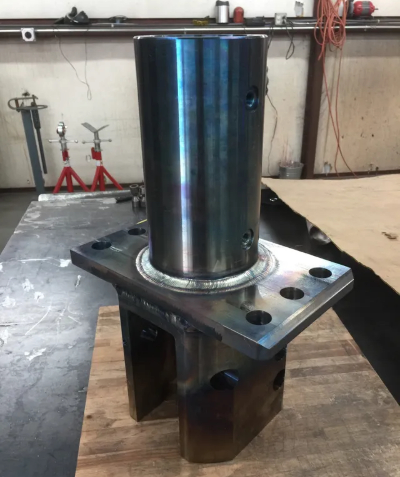 Custom heavy-duty machined steel weldment and fabrication assembly in Houston shop