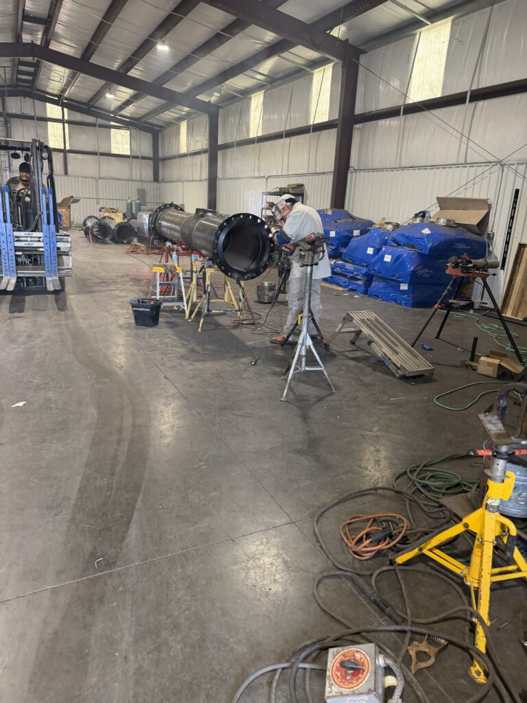 Certified pipe welding and industrial shop fabrication in Houston, TX facility.